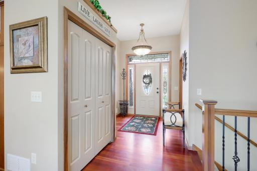 Spacious front foyer area. The 10 foot ceilings offer the space for the transom window above front entry door and two sidelights to boot.