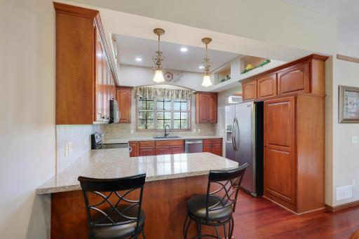 The pantry offers rolling drawers for easy access.