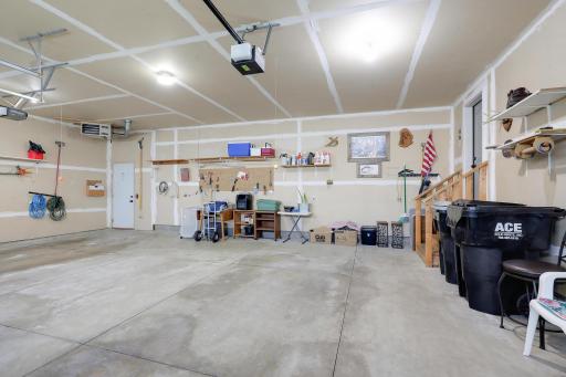 The attached 32 x 24 garage is heated and insulated. Note hanging heater above service door.