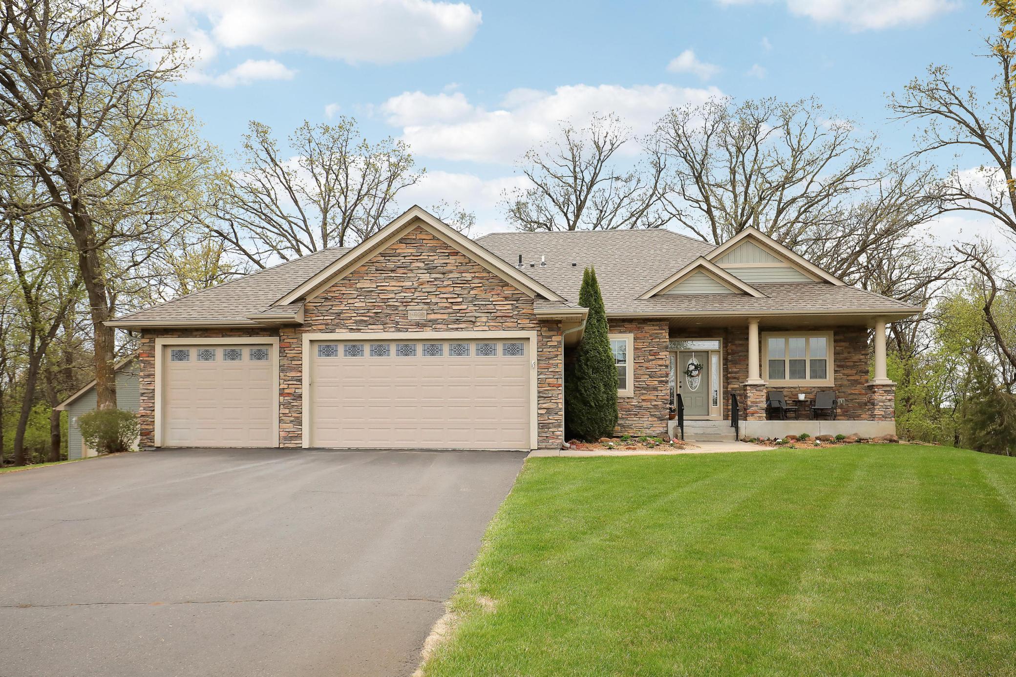 This walkout rambler features a stunning stone front.