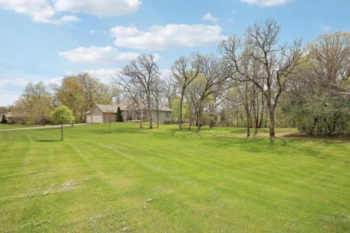 This view from the NW shows even more front yard space.