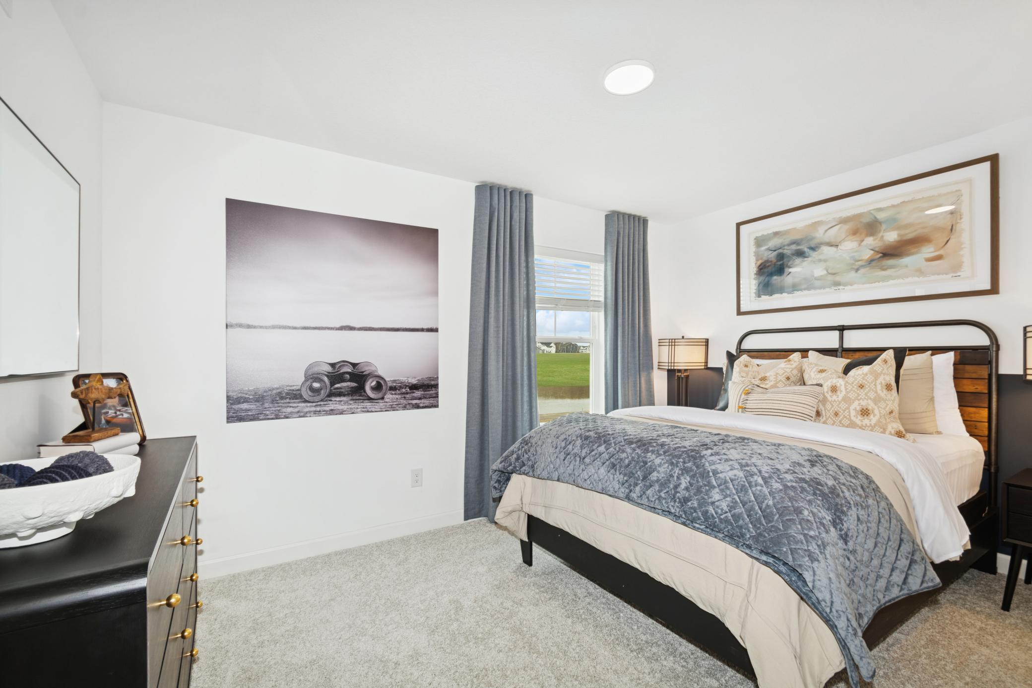 (Photo of model home, features will vary) The larger of the two secondary bedrooms, this retreat is ideal for residents who require more personal space and privacy.