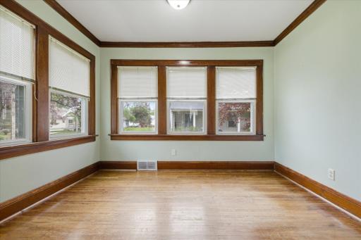 Main floor sunroom could serve as an office or flex space.