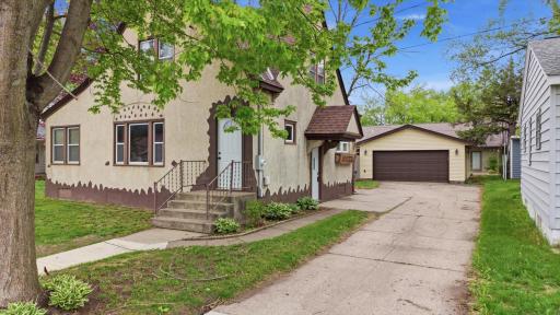 Charming 1.5 story home with Tudor Revival influences.