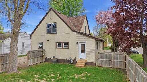 The fully-fenced backyard has convenient new rear access from the mudroom.