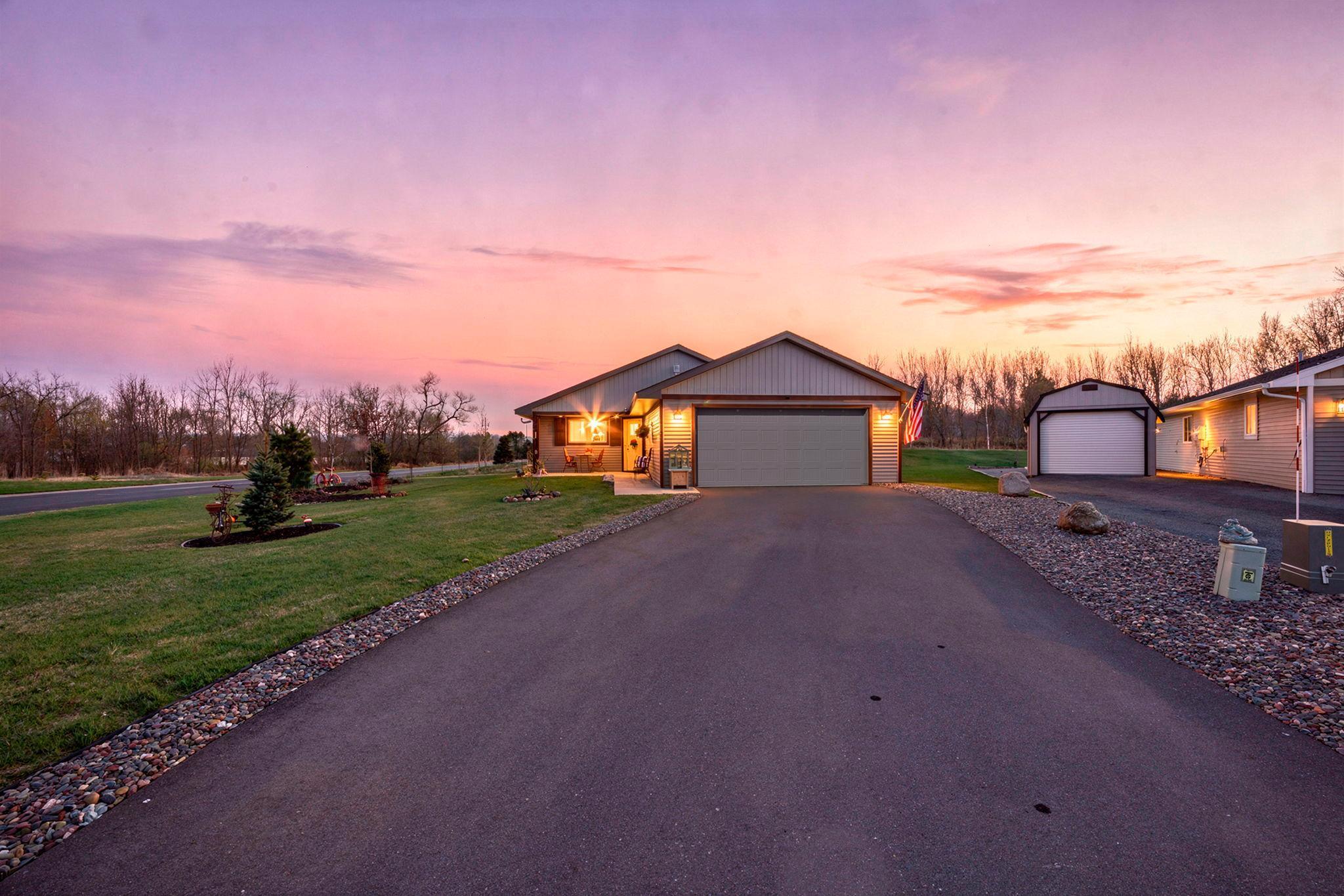 Plenty of parking space and asphalt driveway