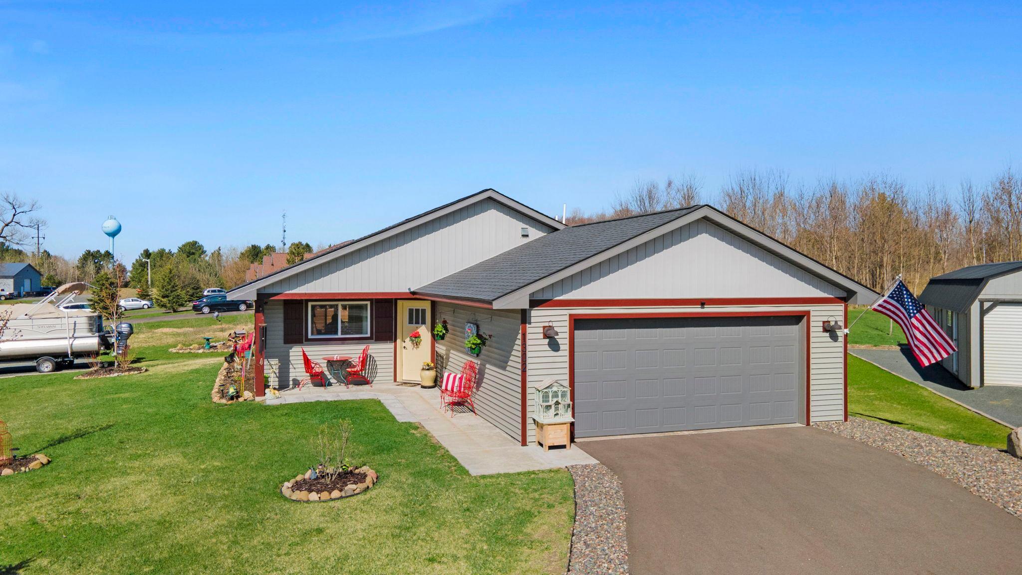 Inviting front entry with patio area