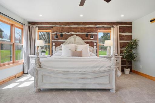 Spacious bedroom with serene views of the private property.