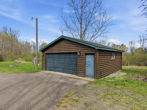 Detached two car garage is perfect for cars or toys.