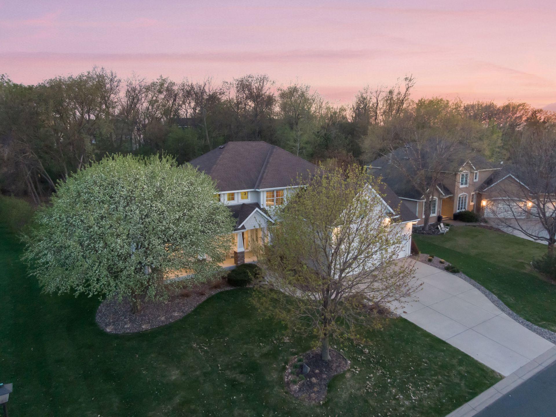 Situated on a corner lot backing up to woods!
