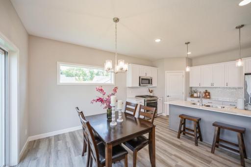 Dining - photo is of a staged model home with same floorplan