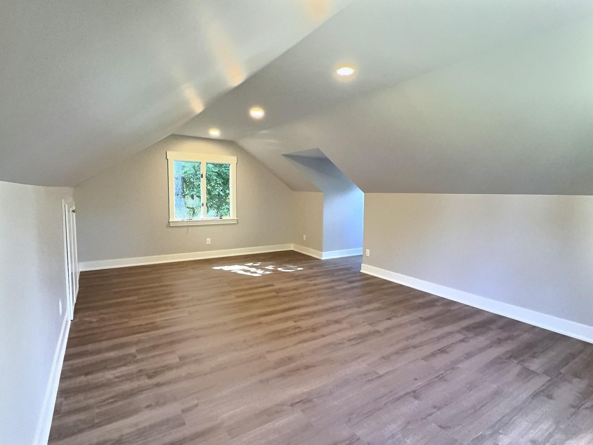 The bonus space above the garage approximately 370 square feet additional living space. Use it as extra sleeping quarters, a game room, or create the ultimate entertainment area adding a bar and pool table, dart board or pin ball machine.
