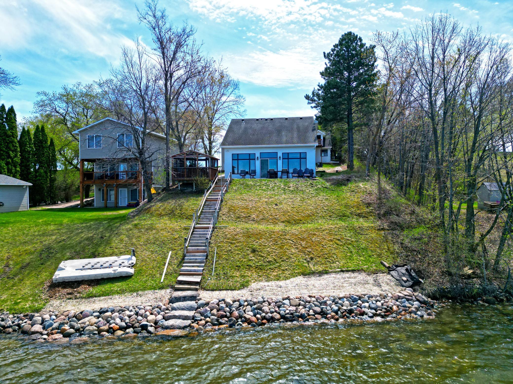 Recently enhanced rip rap shoreline completed in winter of 2026 by a top area landscape company. The old railroad ties were removed and finished with stone.