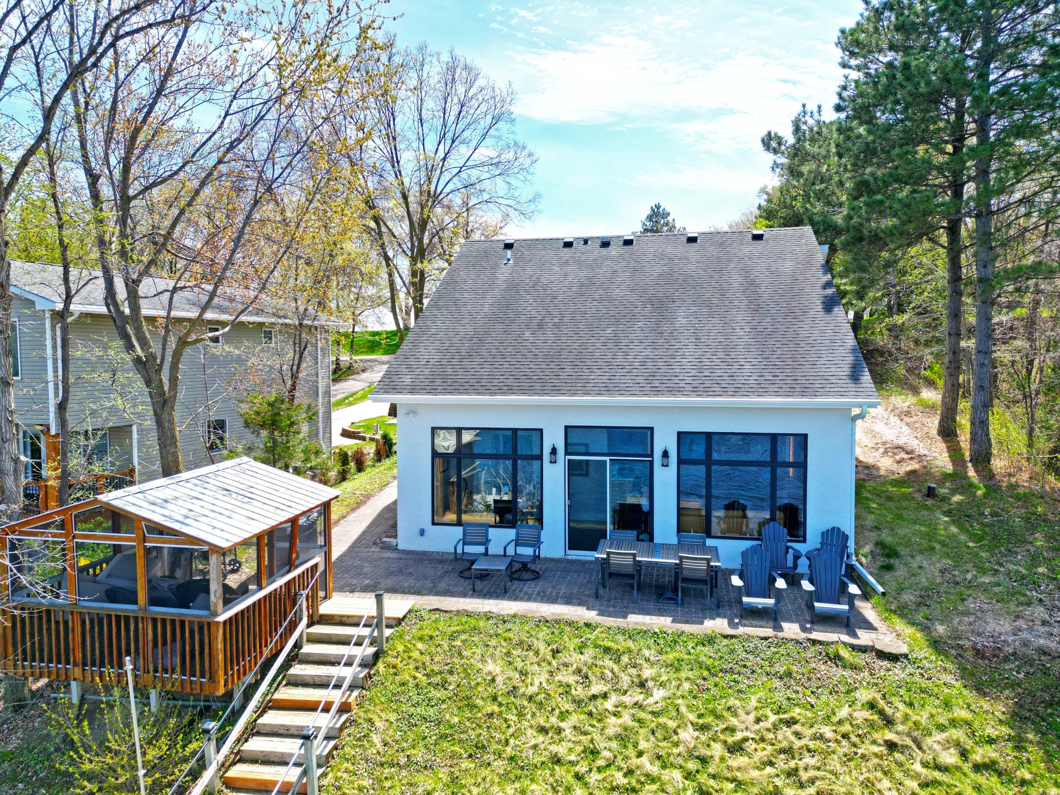 The paver brick patio runs along the lake side of the home so plenty of room to design your outdoor living space as you desire.