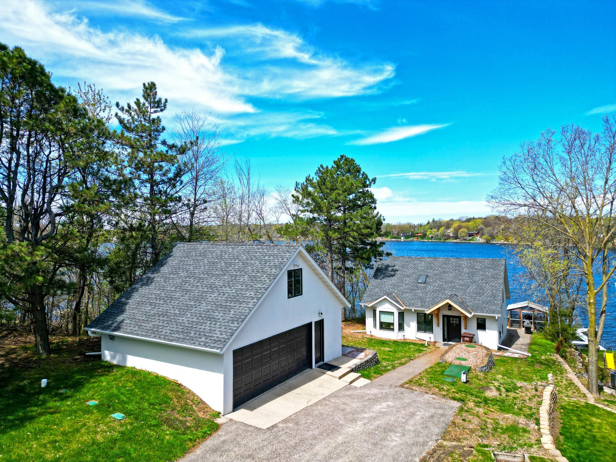 This beautifully renovated lakefront home offers the perfect blend of modern updates and natural charm, ideal for enjoying the lake lifestyle year-round.