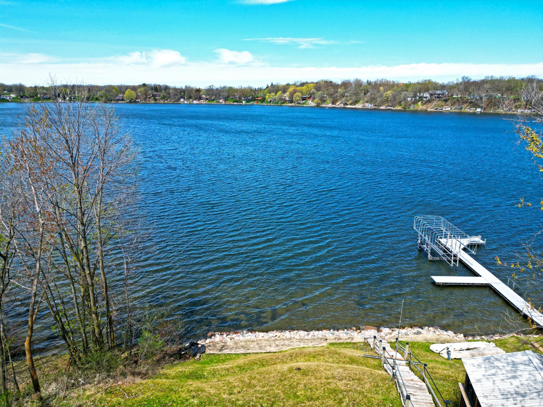 Outdoor living and views are excellent at this property. The lakeside paver brick patio is perfect for relaxing or entertaining with unbeatable lake views
