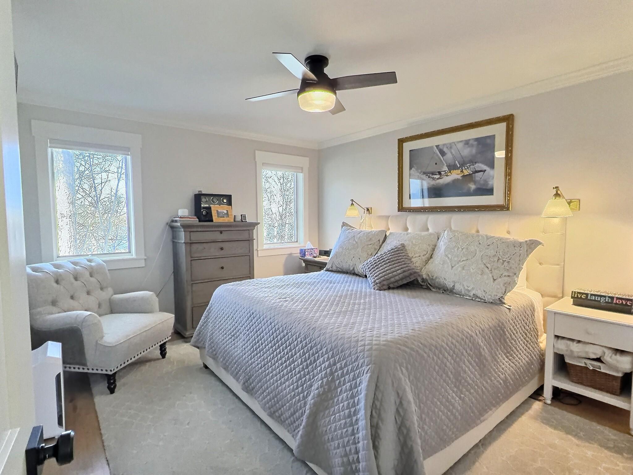 The 2nd of the upper level bedrooms with a built in closet accessories.