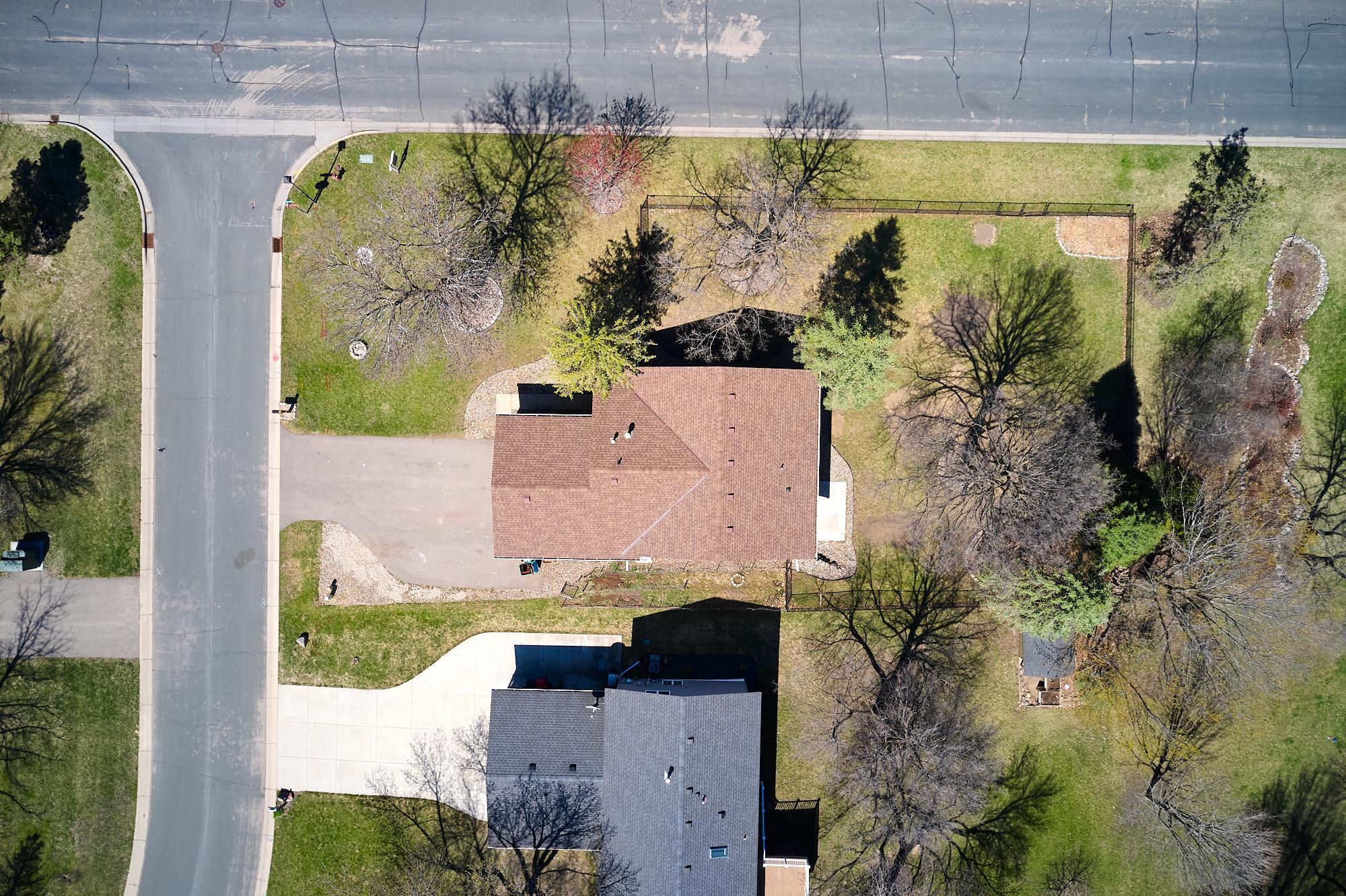 A beautiful lot with mature trees & 2 apple trees, a pear tree, and a grapevine.
