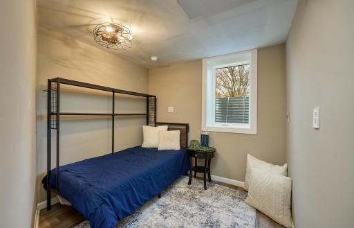 the fourth bedroom is on the walkout level with an egress window
