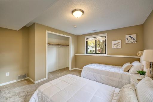 The third bedroom is on the walkout level with 2 above-ground windows