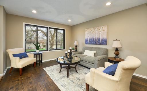 Sunlight fills the living room. Sellers loved bird watching from this window.