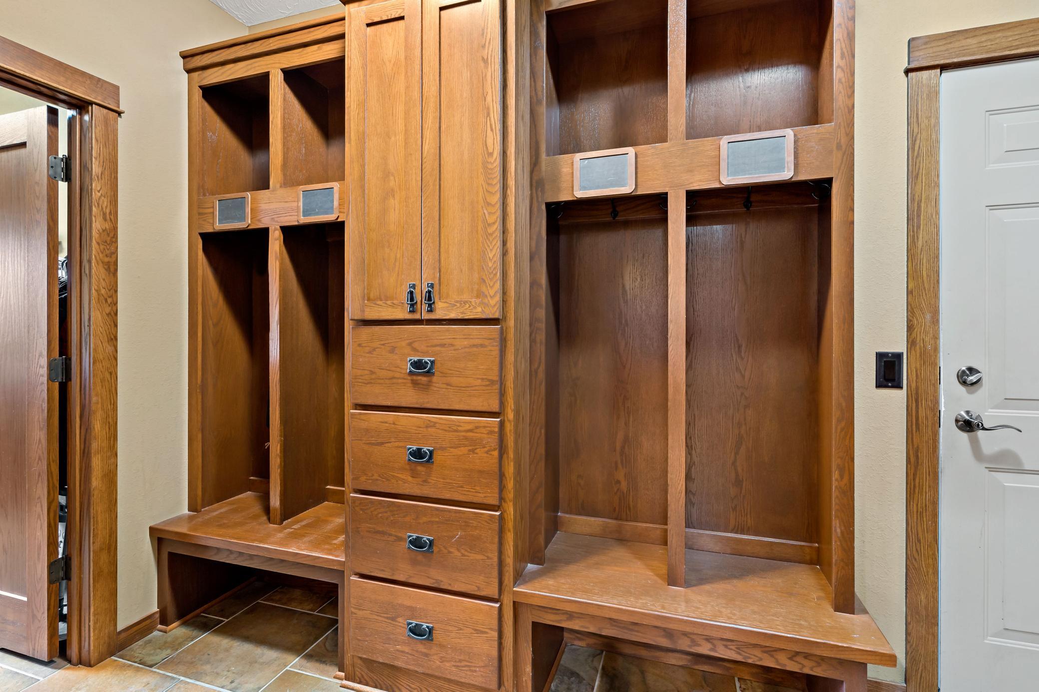 This mud room was built for Minnesotans! cubbies for hats, gloves, coats and boots are just the beginning. Ceramic tile floors can take all the grit and grime of our winter mess.