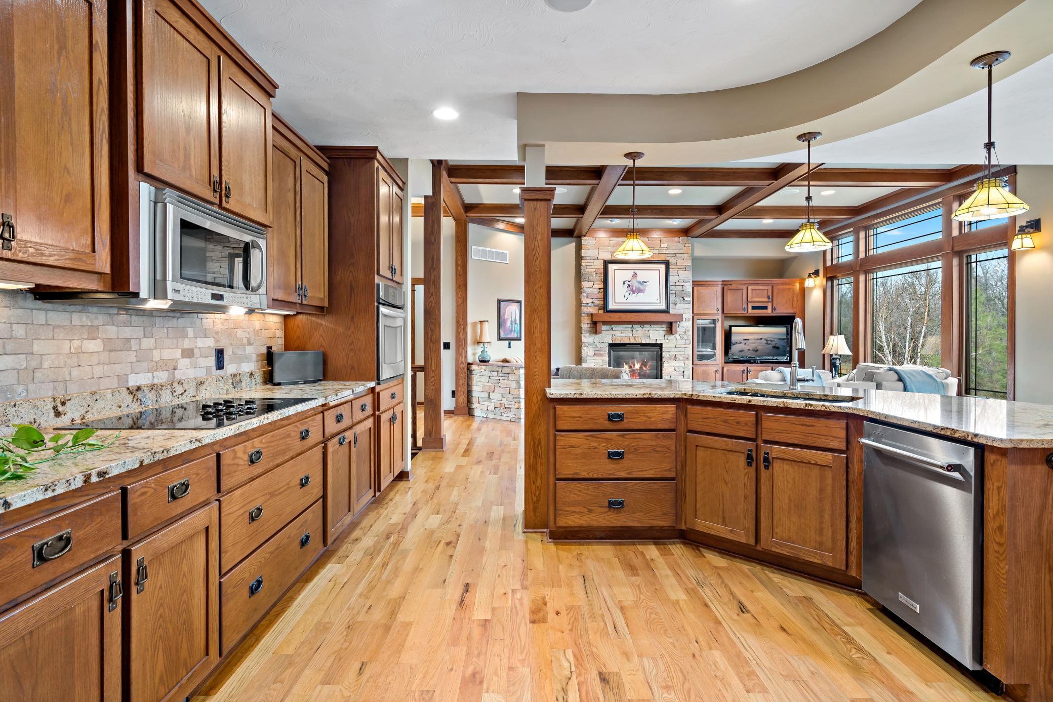 Stainless steel appliances, tile backsplash, and granite countertops are just the beginning. The refrigerator serves TWO sizes of ice cubes and was replaced in 2023 and the dishwasher was replaced in 2024.