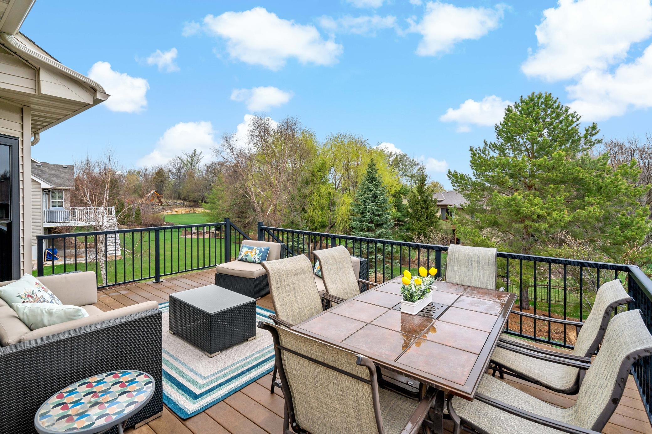 Maintenance free deck wraps around to the side of the home and connects to the garage through a man door also features new maintenance free railings (2020)