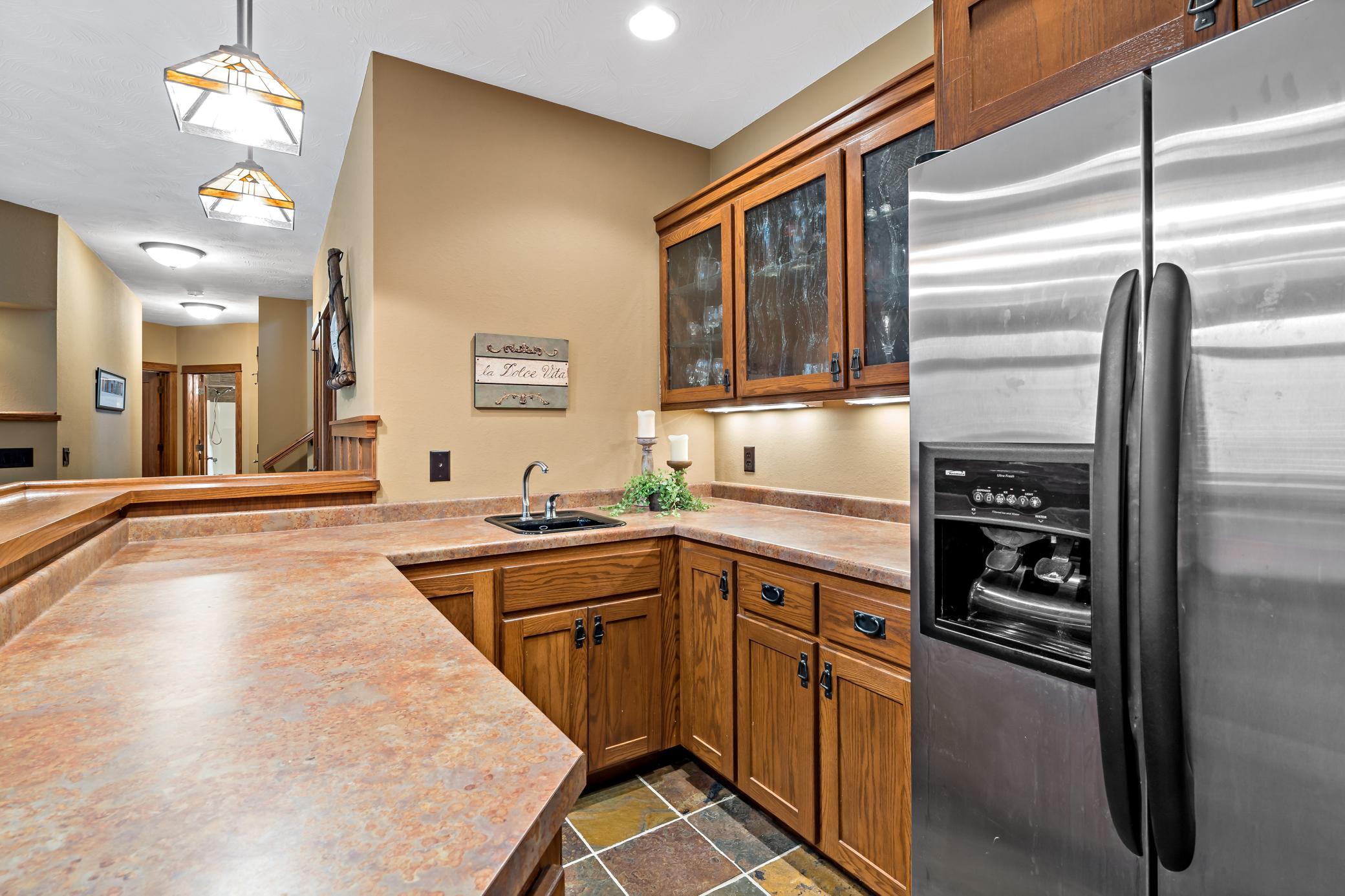 A close up look at the walk behind wet bar and all its features.