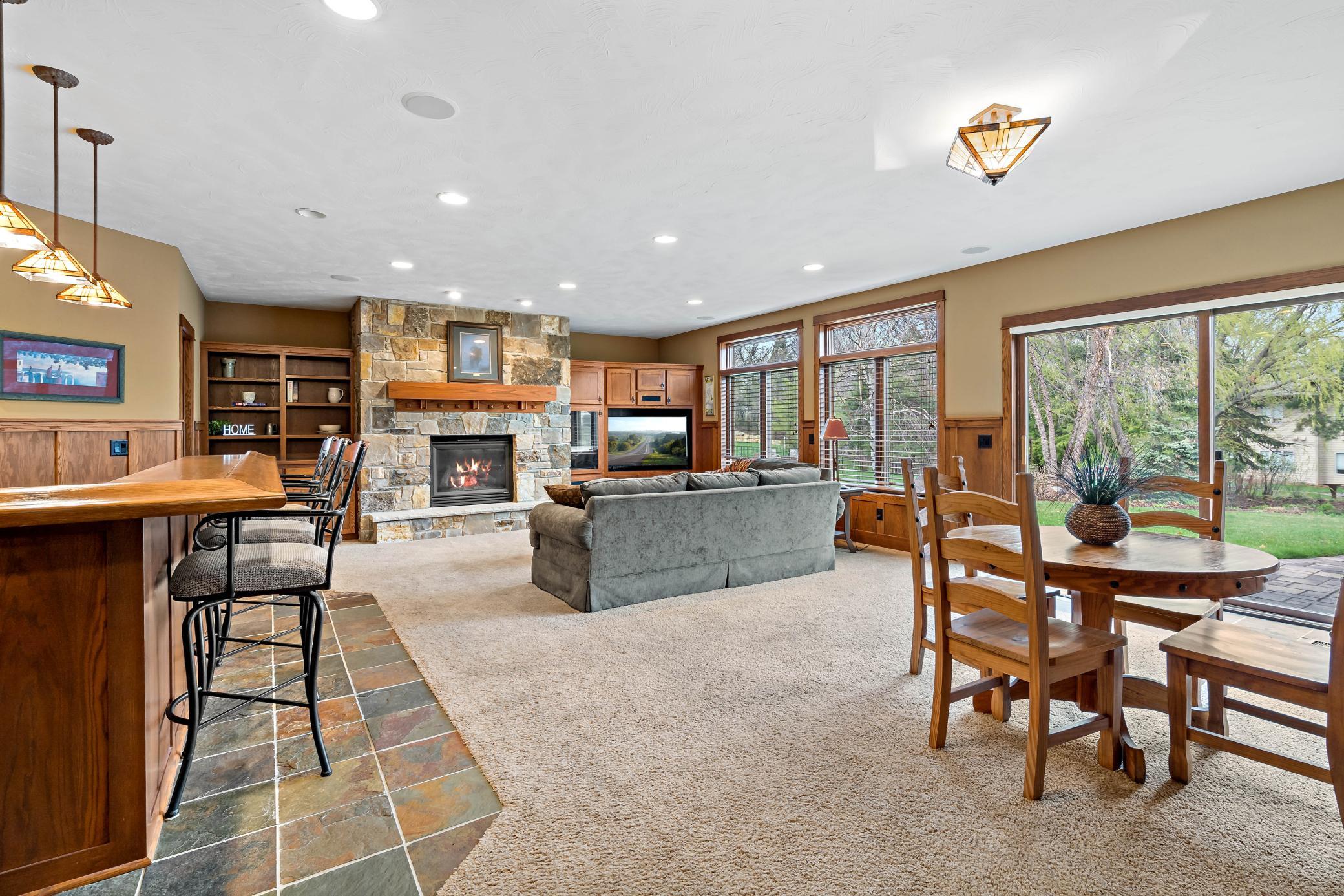 Oversized Lower level family room allows for a variety of layouts and purposes.