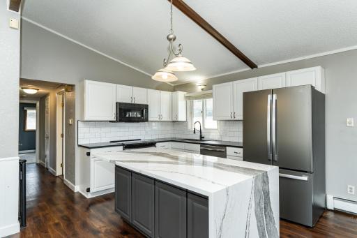 Kitchen with cambria couner tops with waterfall