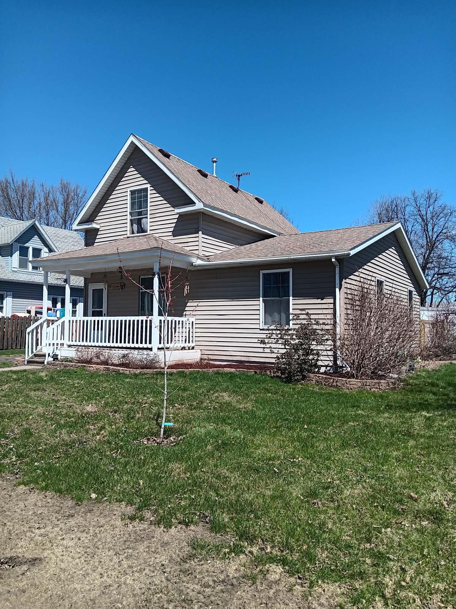 New grass seed & maple trees in front.