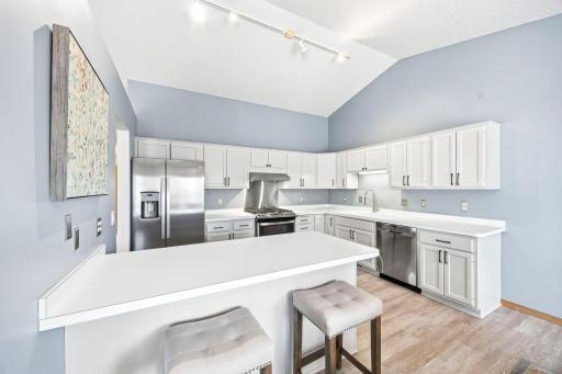 Welcome home! Love the enameled cabinets and new hardware