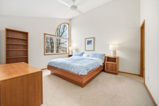 Primary suite has vaulted ceiling, walk-in closet and private 3/4 bath