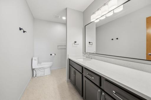 New countertop, enameled cabinets, new hardware and lighting