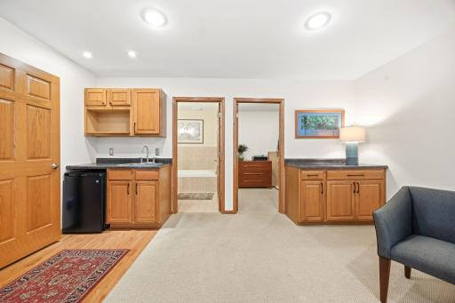 Lower level has private bath, large walk-in closet, mini refrigerator and sink