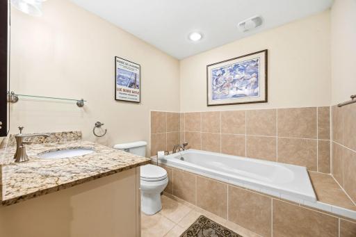 Enjoy relaxing in the soaking tub (with separate sprayer) in your private bath