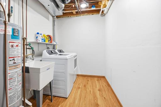 Mechanical/laundry room on lower level is clean and bright