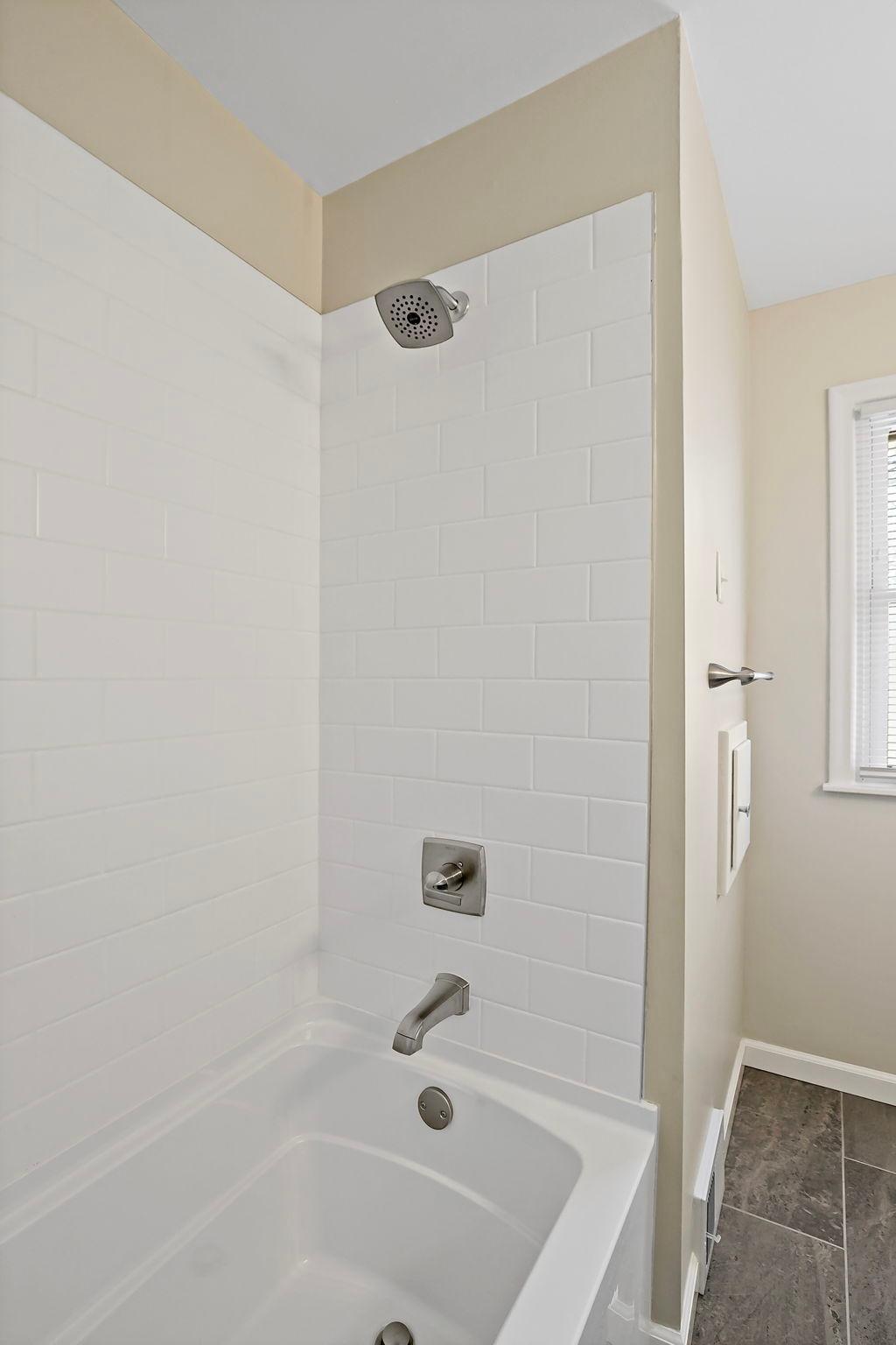 New main floor shower and tub.jpg