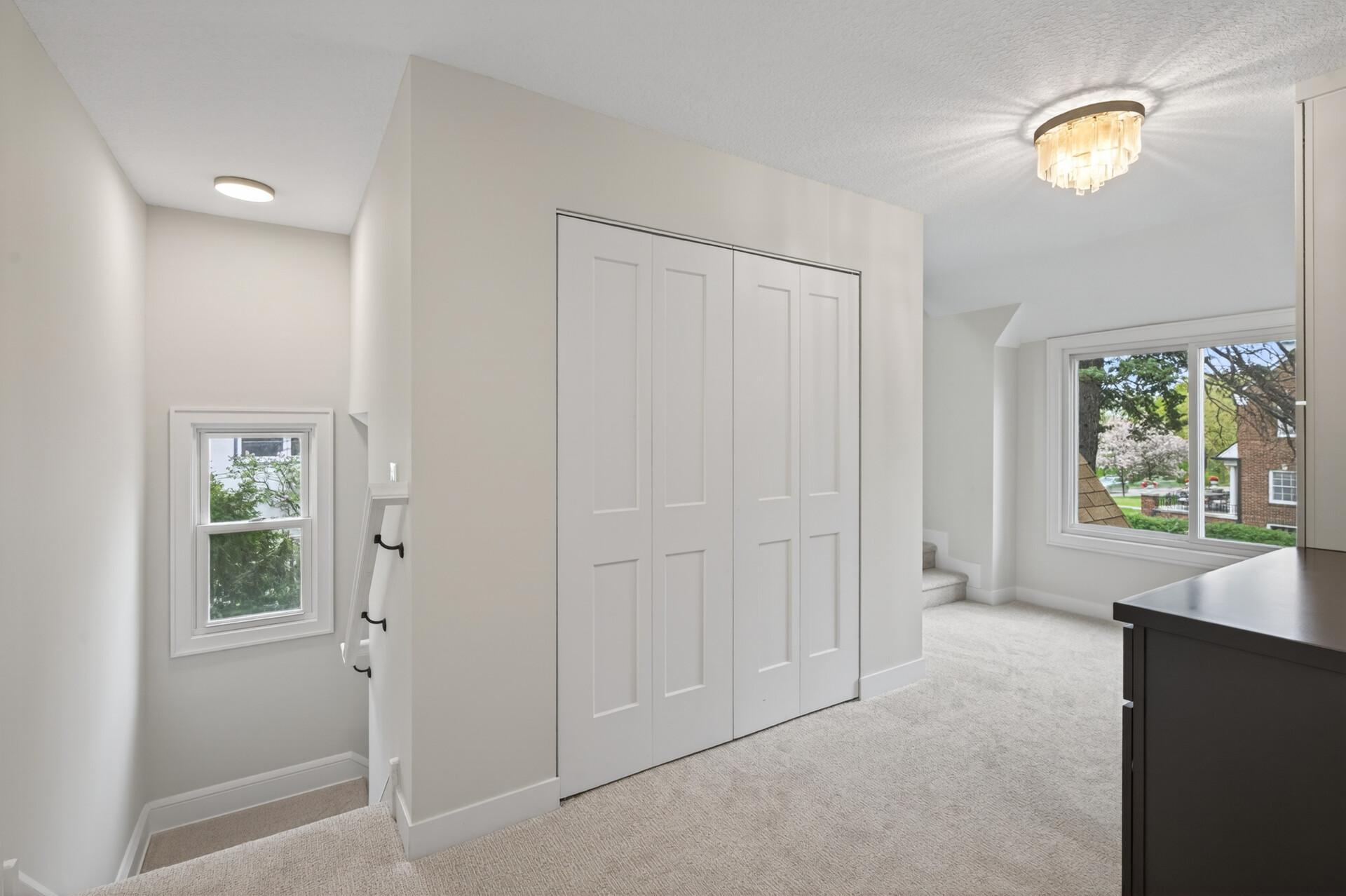 Beautifully designed, upper level laundry space with a new LG washer and dryer, along with cabinetry, counterspace, and floating shelves, making daily routines feel just a bit more elevated.