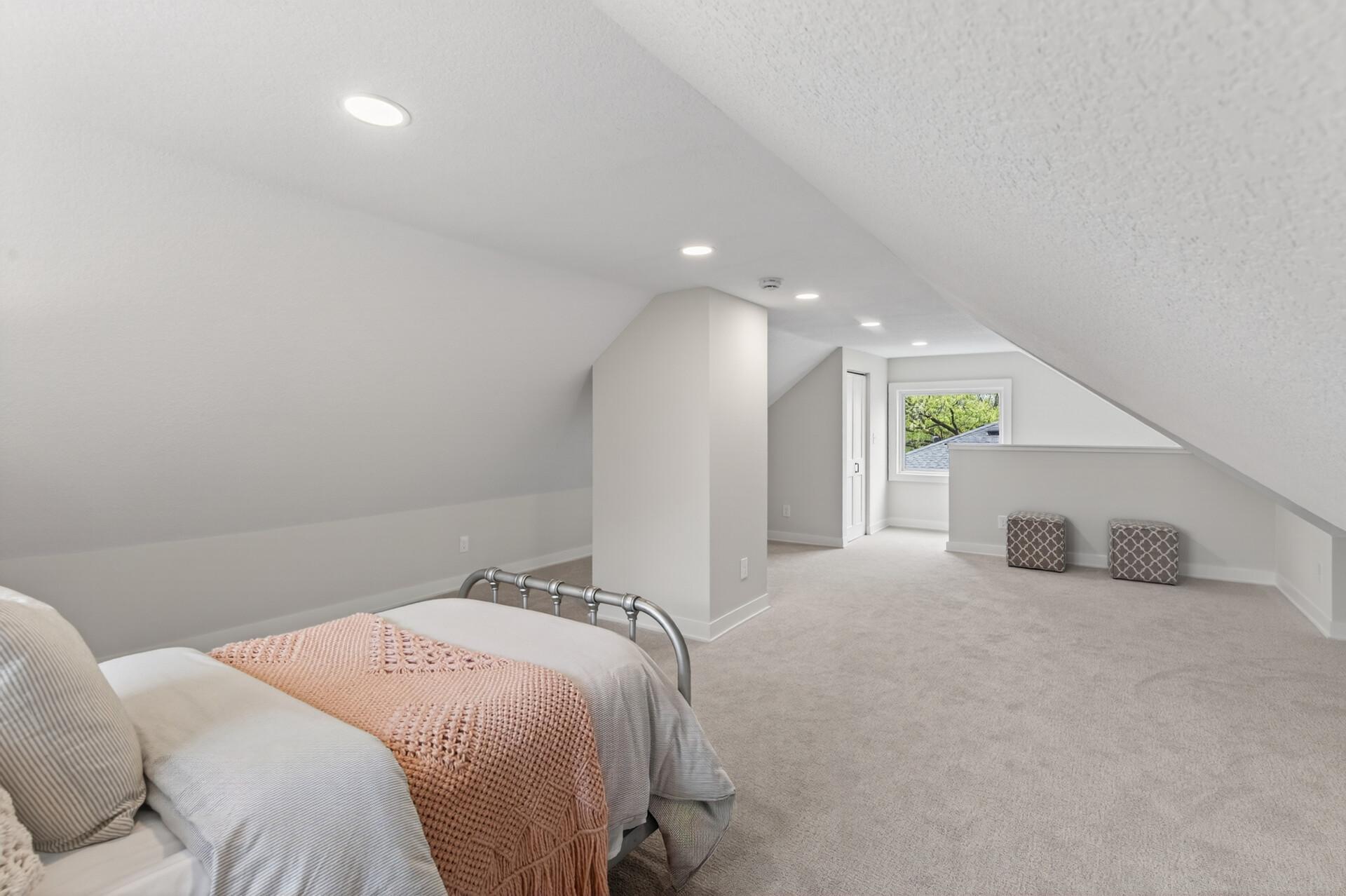 Complete with cozy carpeting, 5x5 closet space , and a new Daikin mini-split for year-round comfort, the space is filled with natural light and even offers views of the lake.
