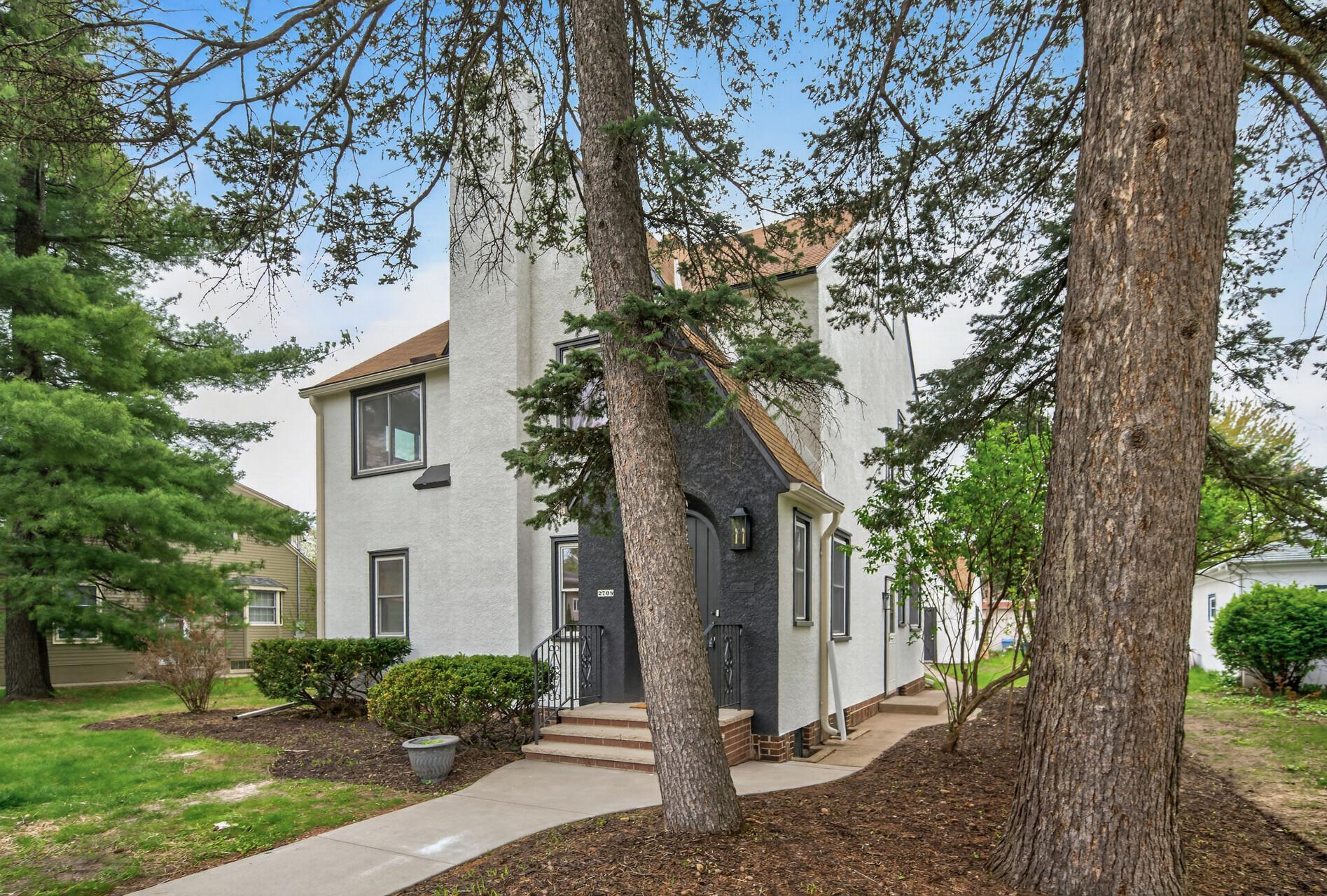 Outside, the updates continue with partially refreshed stucco siding, all new exterior paint, and landscaping that enhances curb appeal.