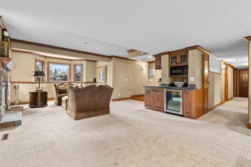 Wet Bar and Room For All of Your Favorite Game Tables