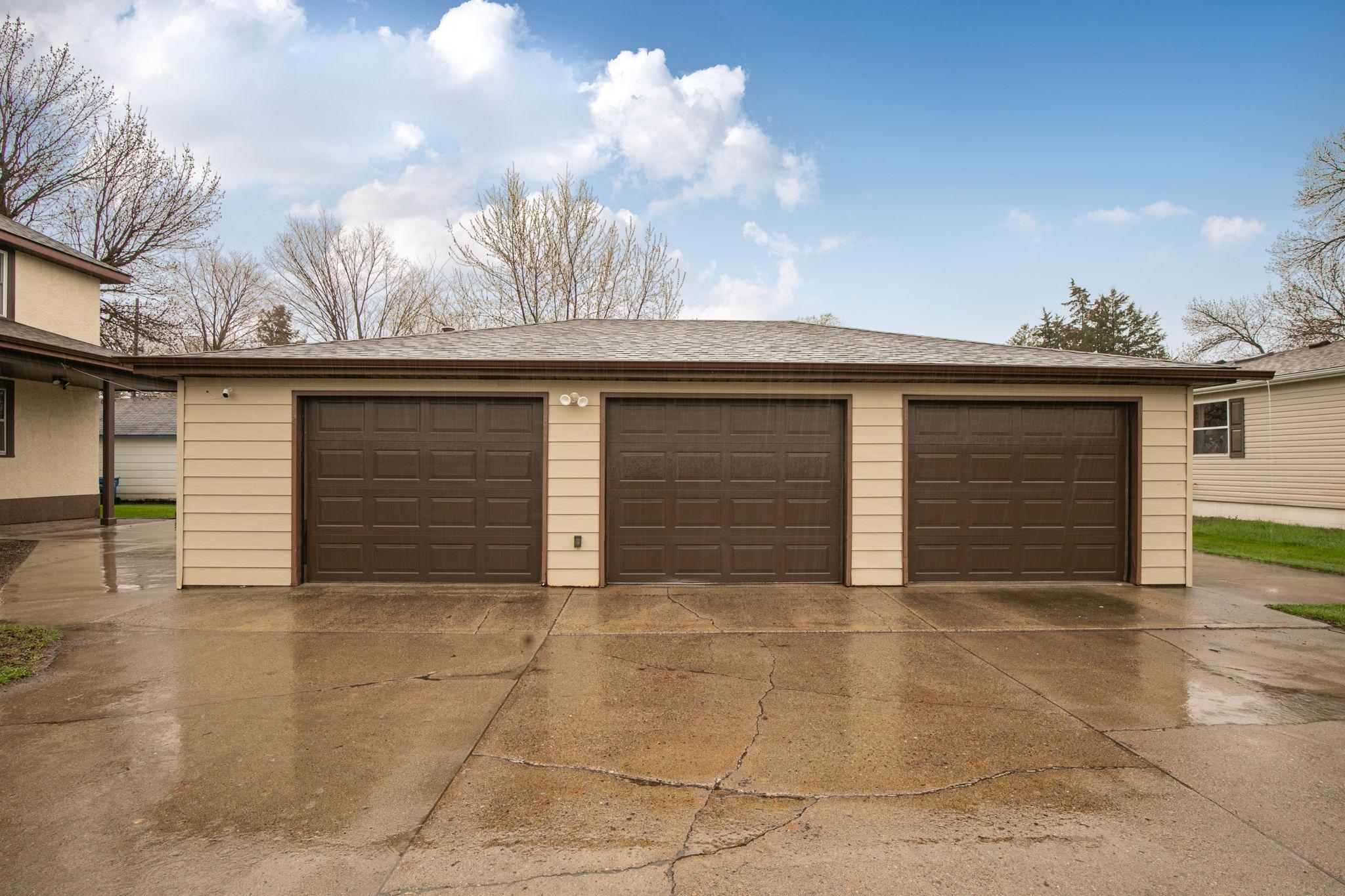 3-Stall Heated Garage. A/C Unit will Stay.