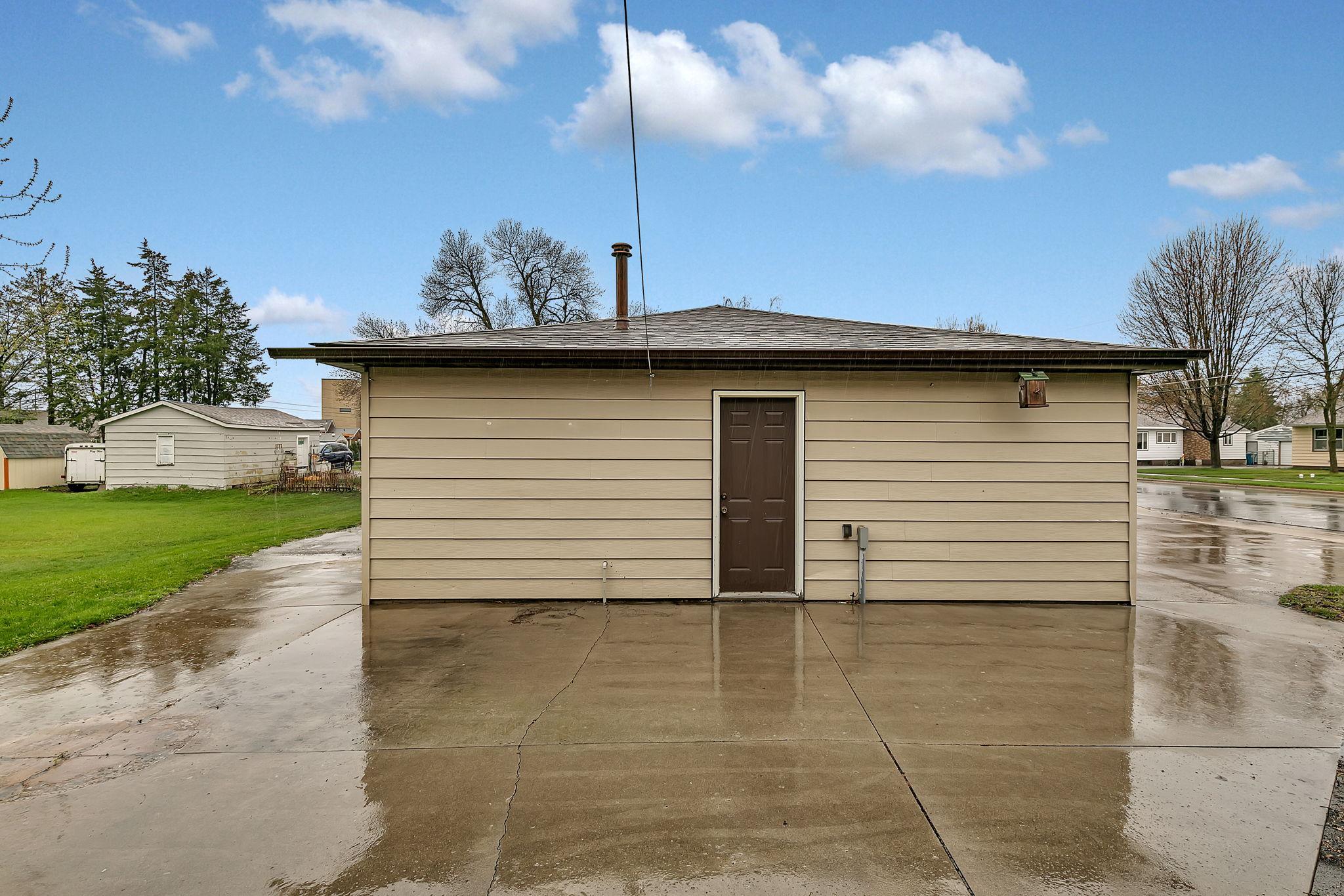 Additional Concrete Slab Behind the Garage for More Storage