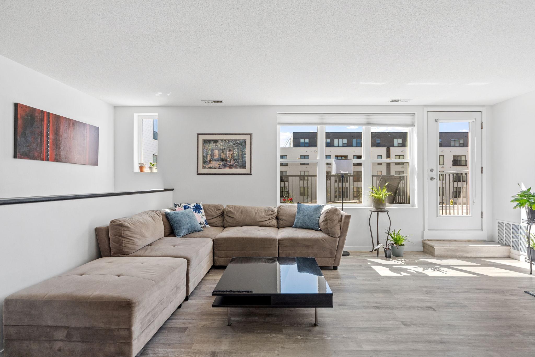 Currently used as a family room and office, this could be a massive bedroom suite.