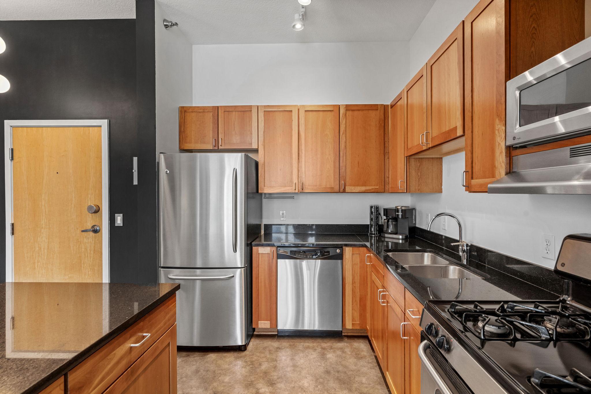 Stainless steel appliances and a massive center island.