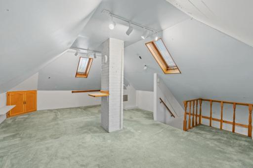 Wow! You have endless possibilities for this finished bonus area with 2 skylights offering light bright spaces