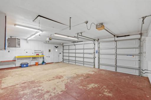 Interior of oversized 3 car garage, insulated & sheet rocked