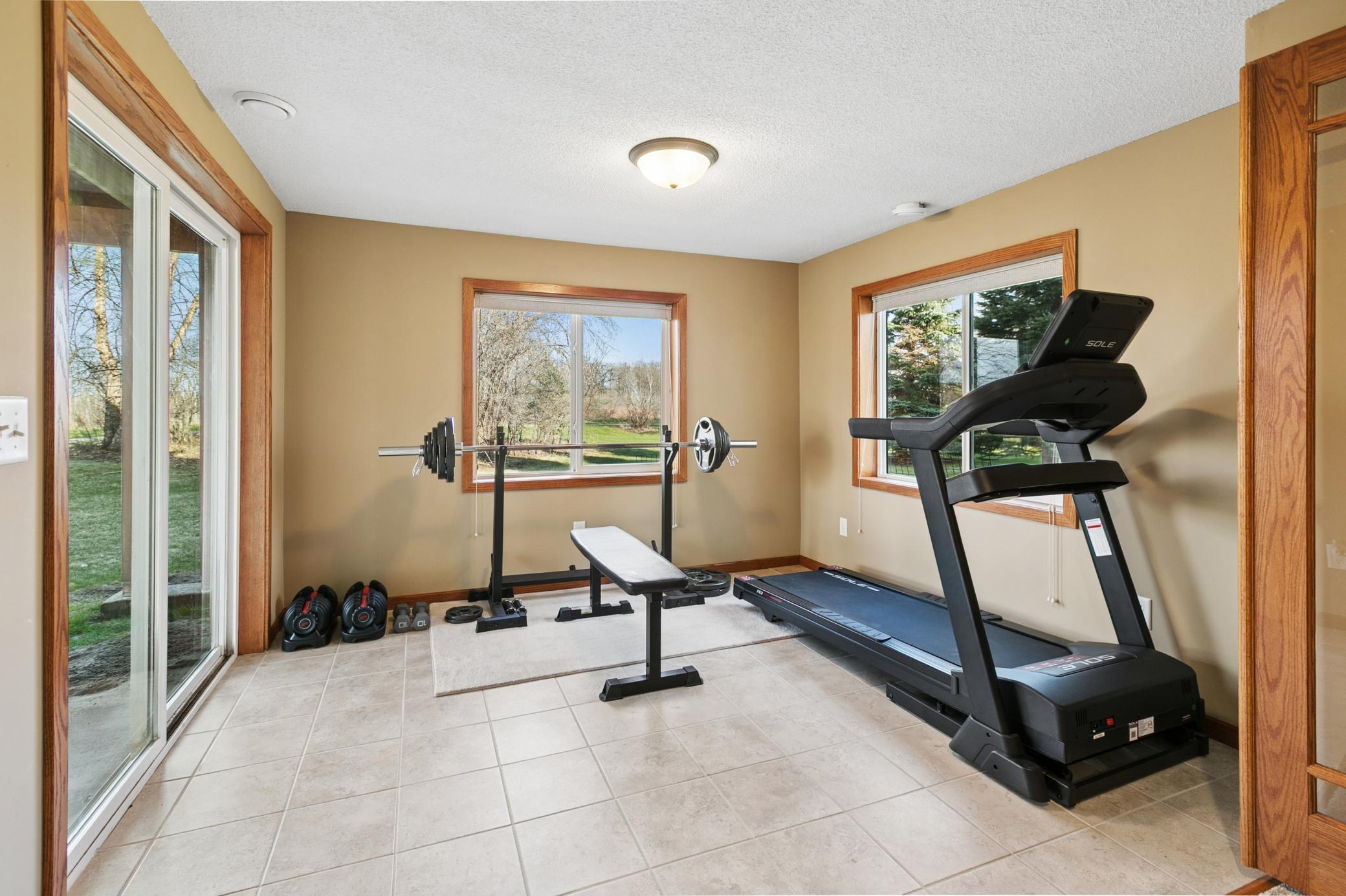 Lower Level Workout Area with Tiled Floors